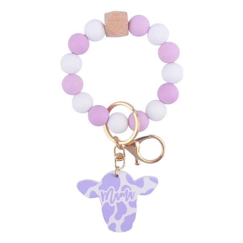 Wholesale Silicone Beads Cartoon Western Style Bull Head Wooden Sign Pendant Bracelet Keychains